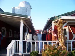 ISA members on the porch of a farm during a fall outing