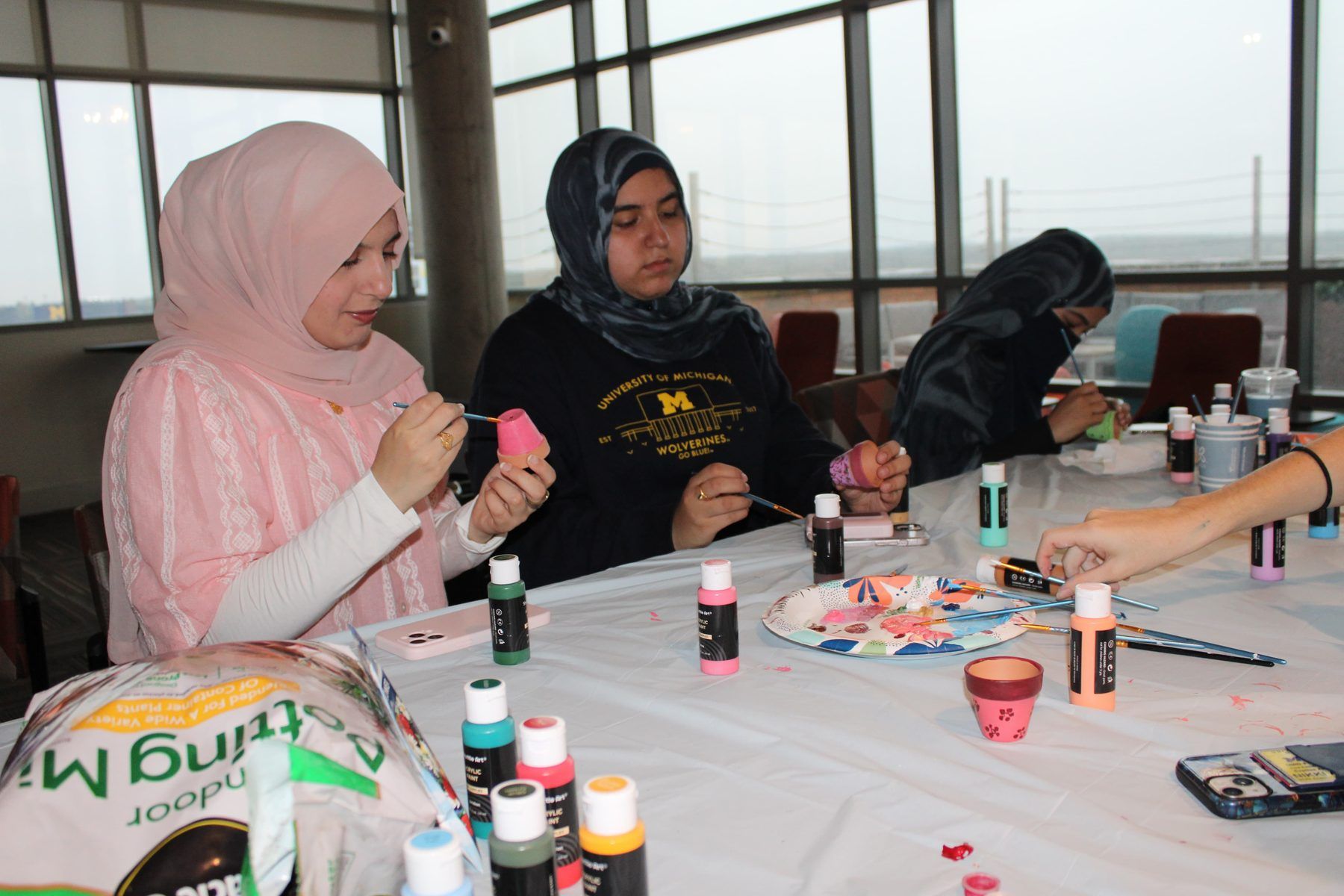 ISA members painting at a craft night