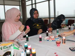 ISA members painting at a craft night