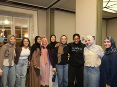 A large group of ISA members posing together at an event