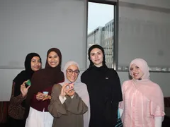 ISA members smiling together indoors